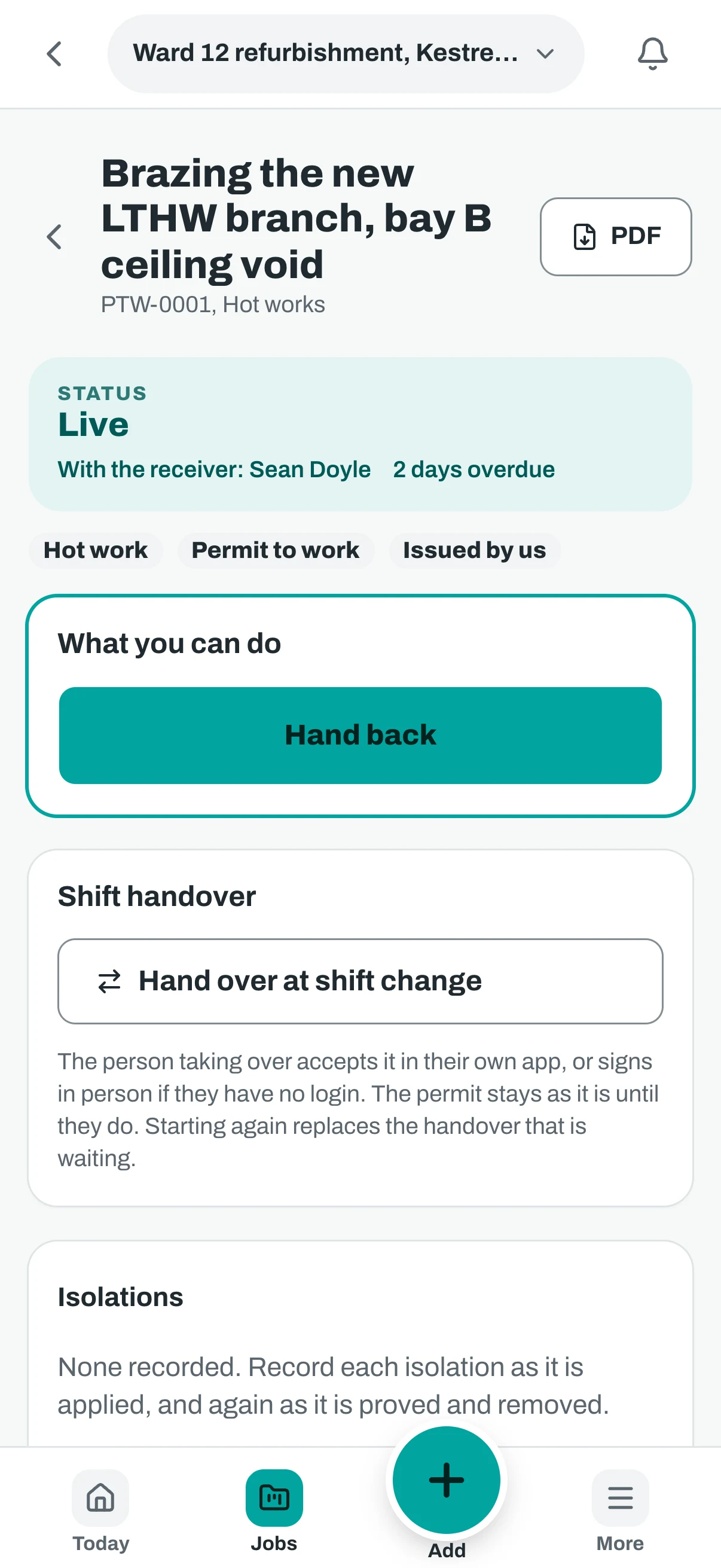 The same hot works permit on a phone, with its status and the hand back button.